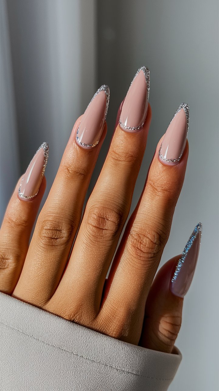 Silver outlined stiletto nails with edgy elegance