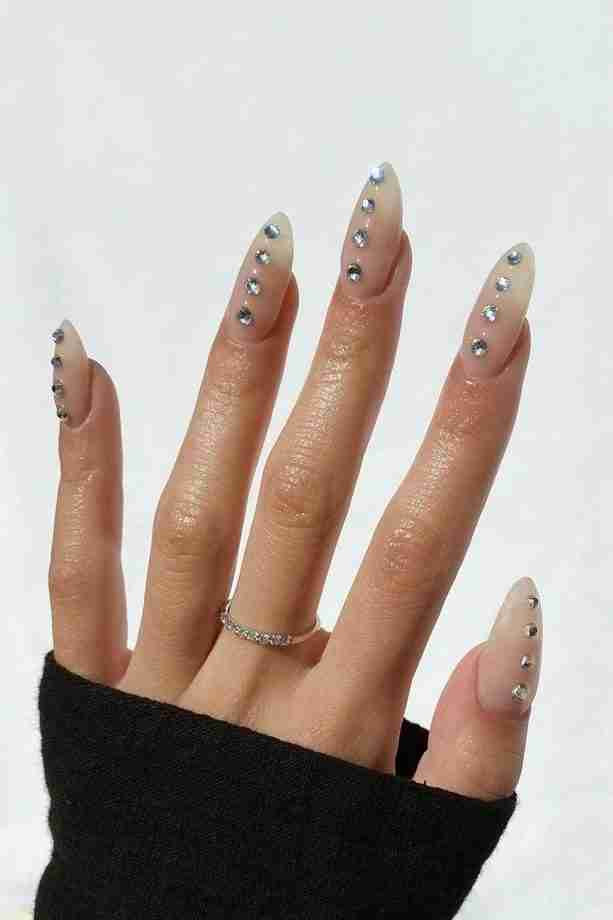 Nude nails with rhinestone accents