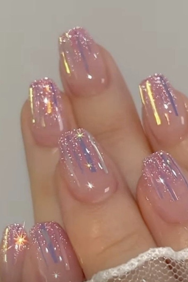 Short nails with subtle pink glitter