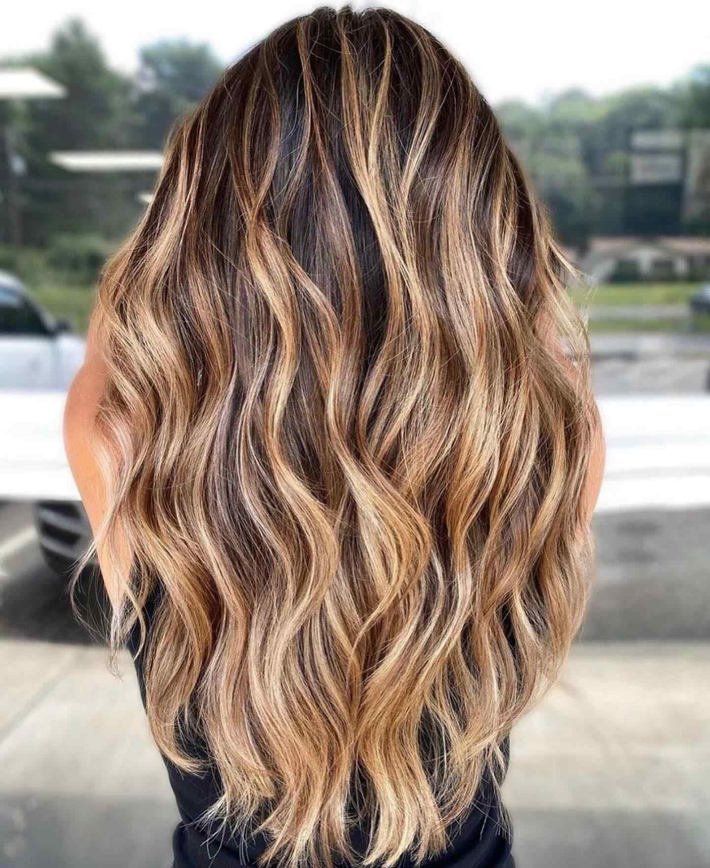 Wavy hair with sun-kissed balayage highlights