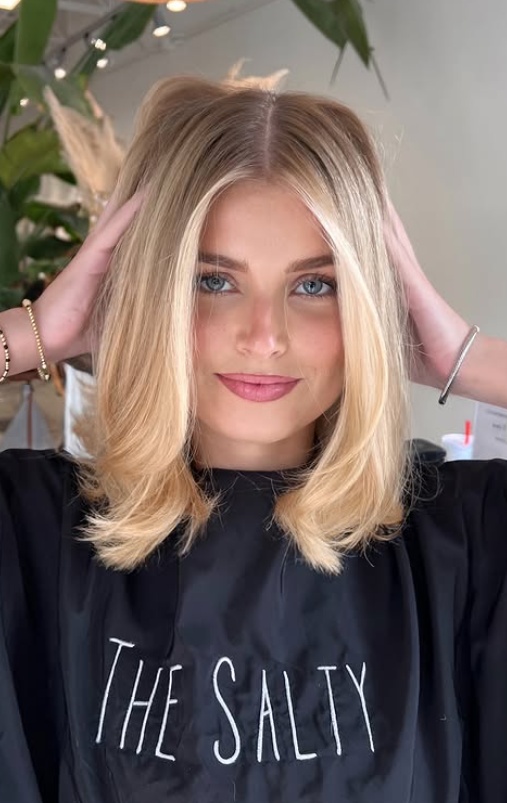 Soft blonde layers with face-framing highlights
