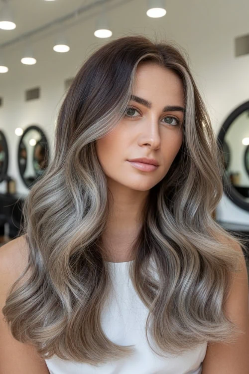 Medium-length soft gray balayage with dark base