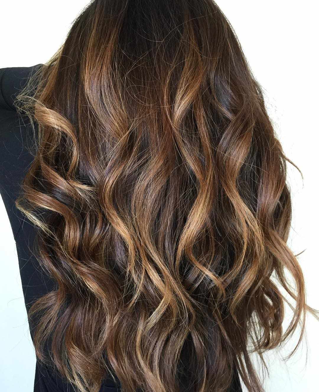 Long warm brunette hair with honey highlights
