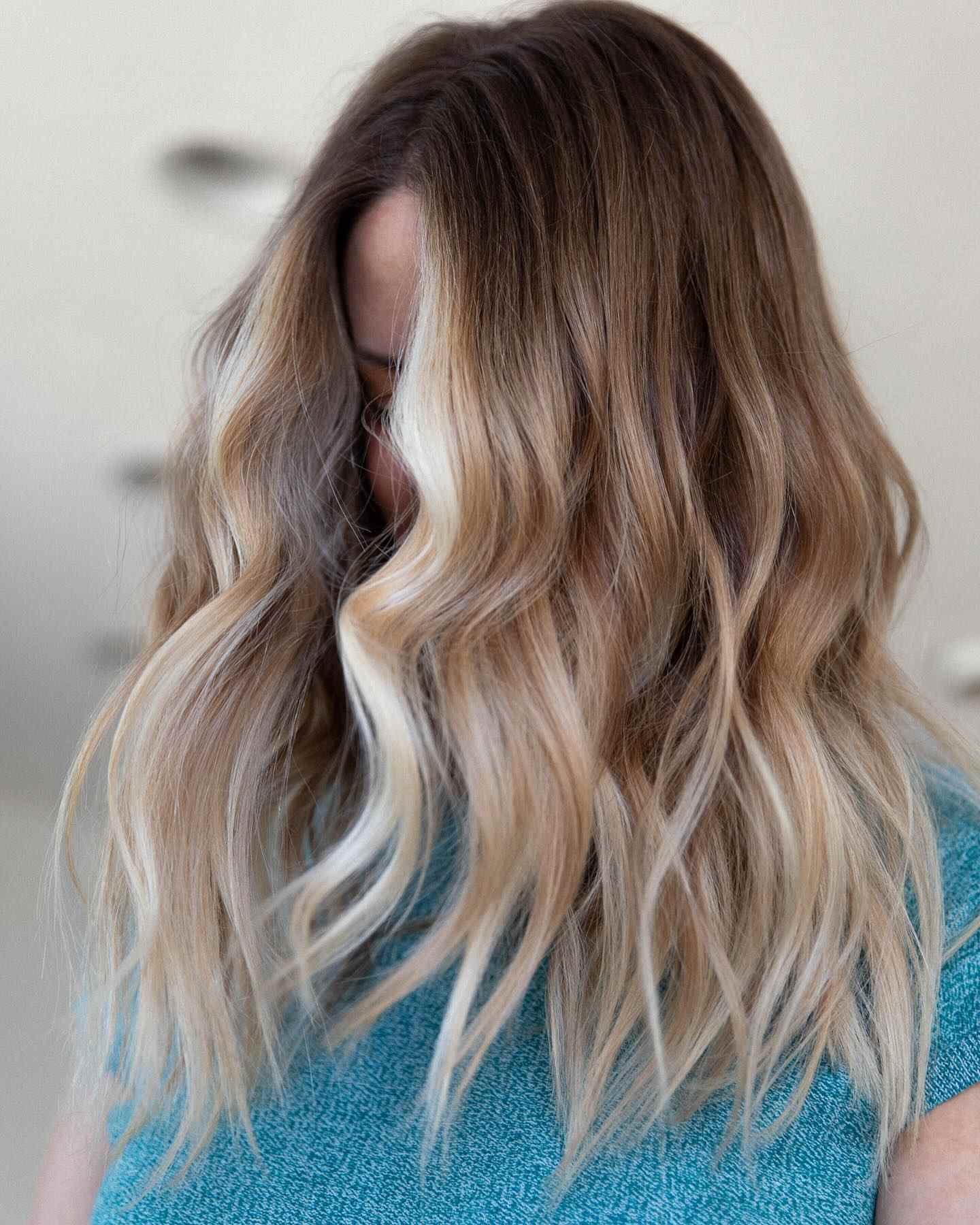 Beachy blonde hair with soft waves