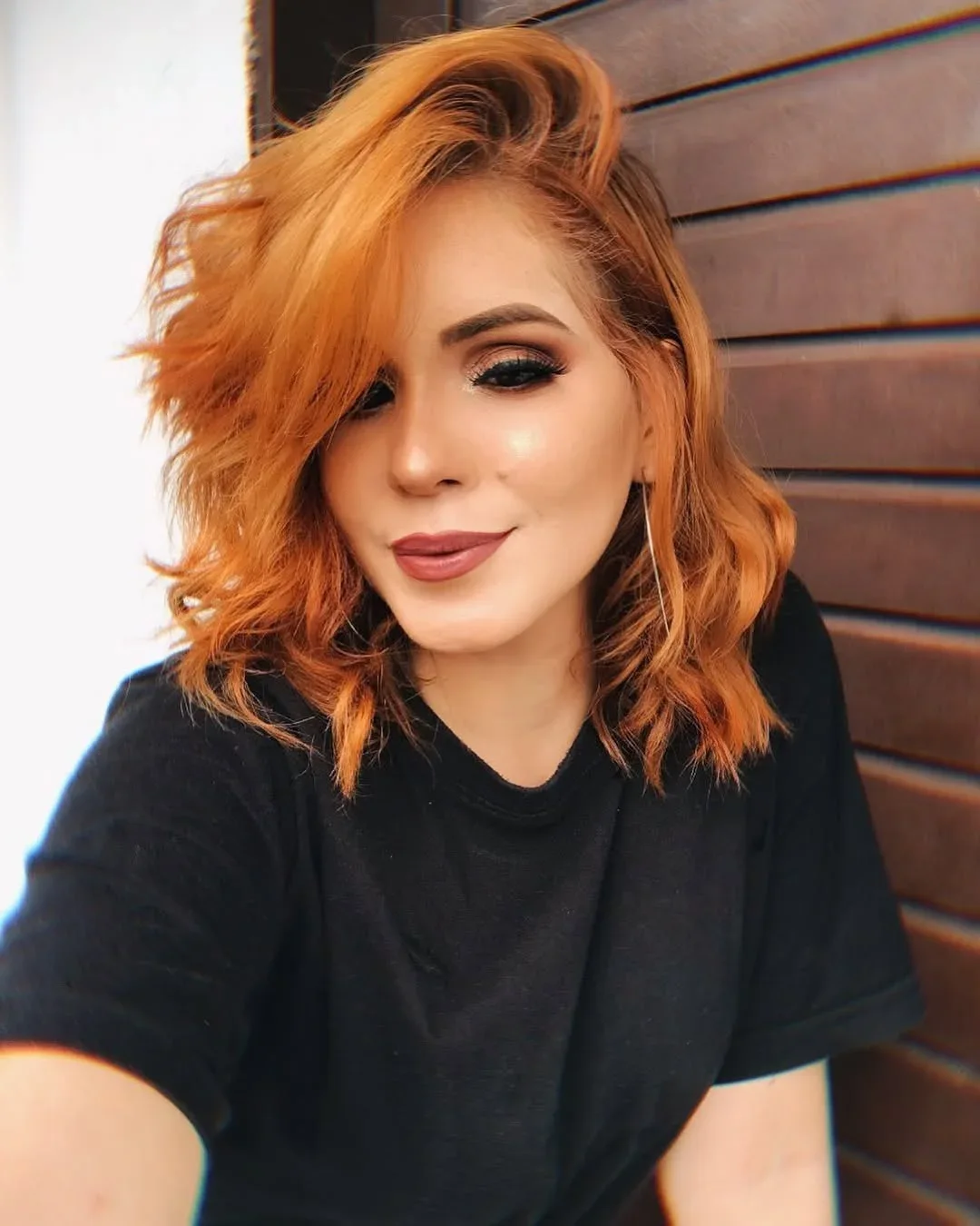 Fiery copper waves with tousled finish for bold elegance