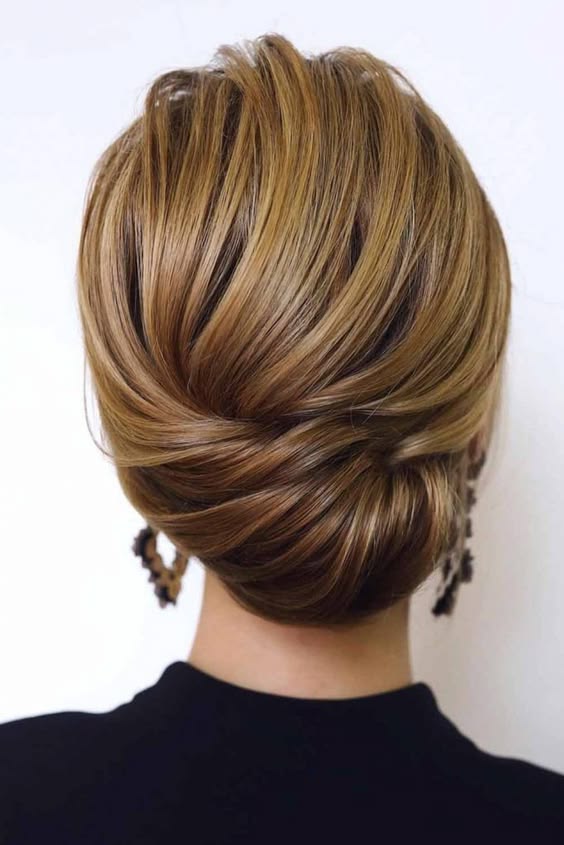 Timeless French twist with sleek finish
