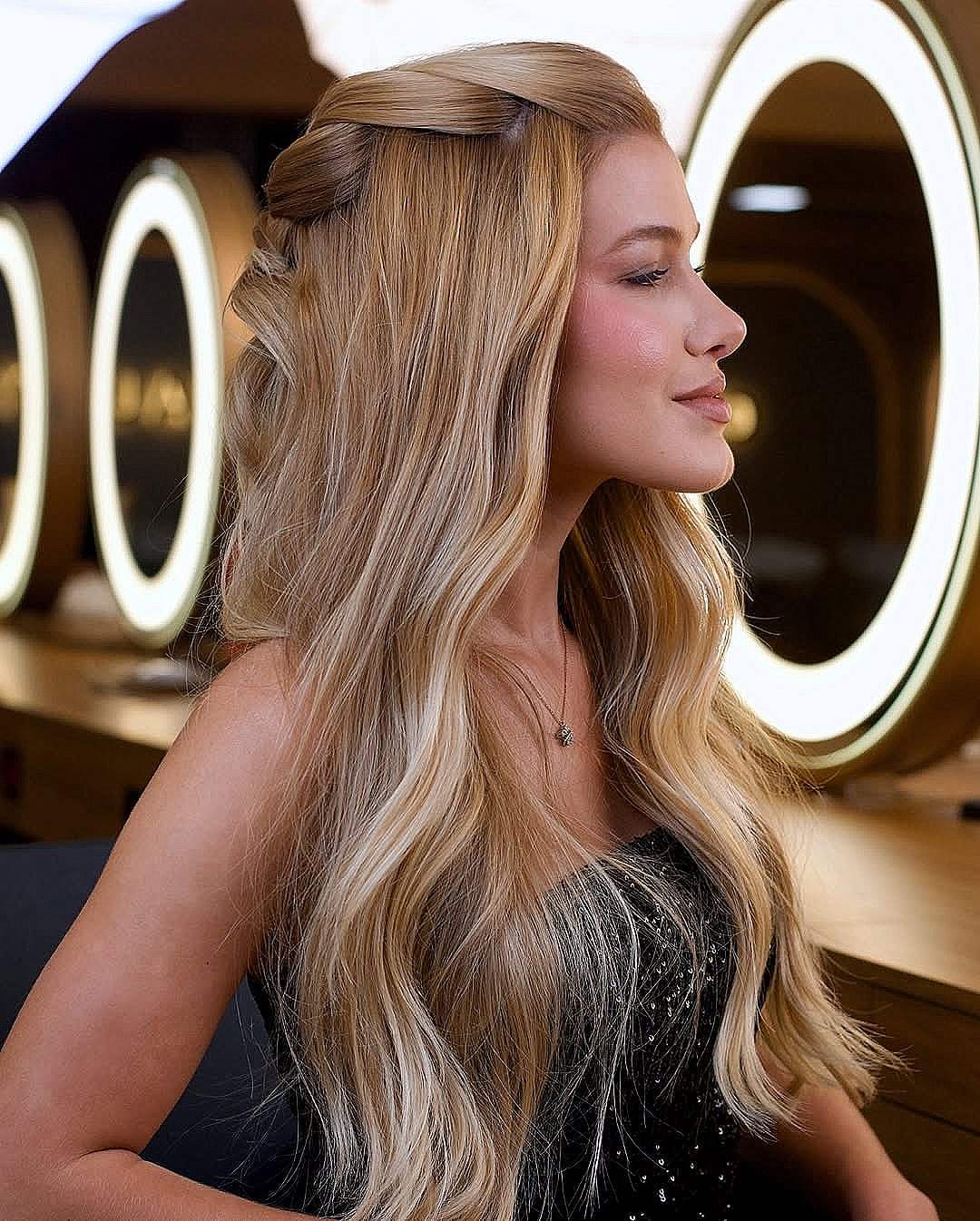 Soft twisted half-up hairstyle for long hair