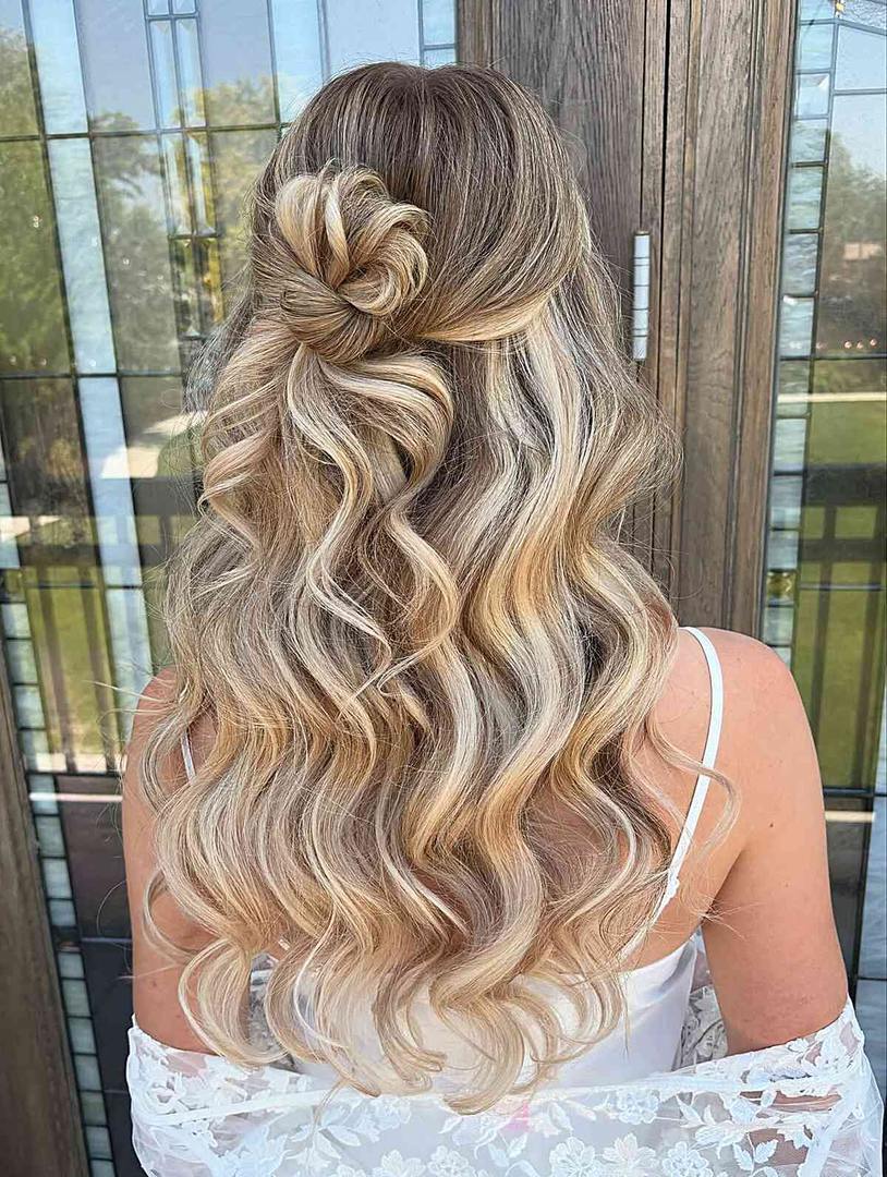 Flowing waves with a twisted top knot