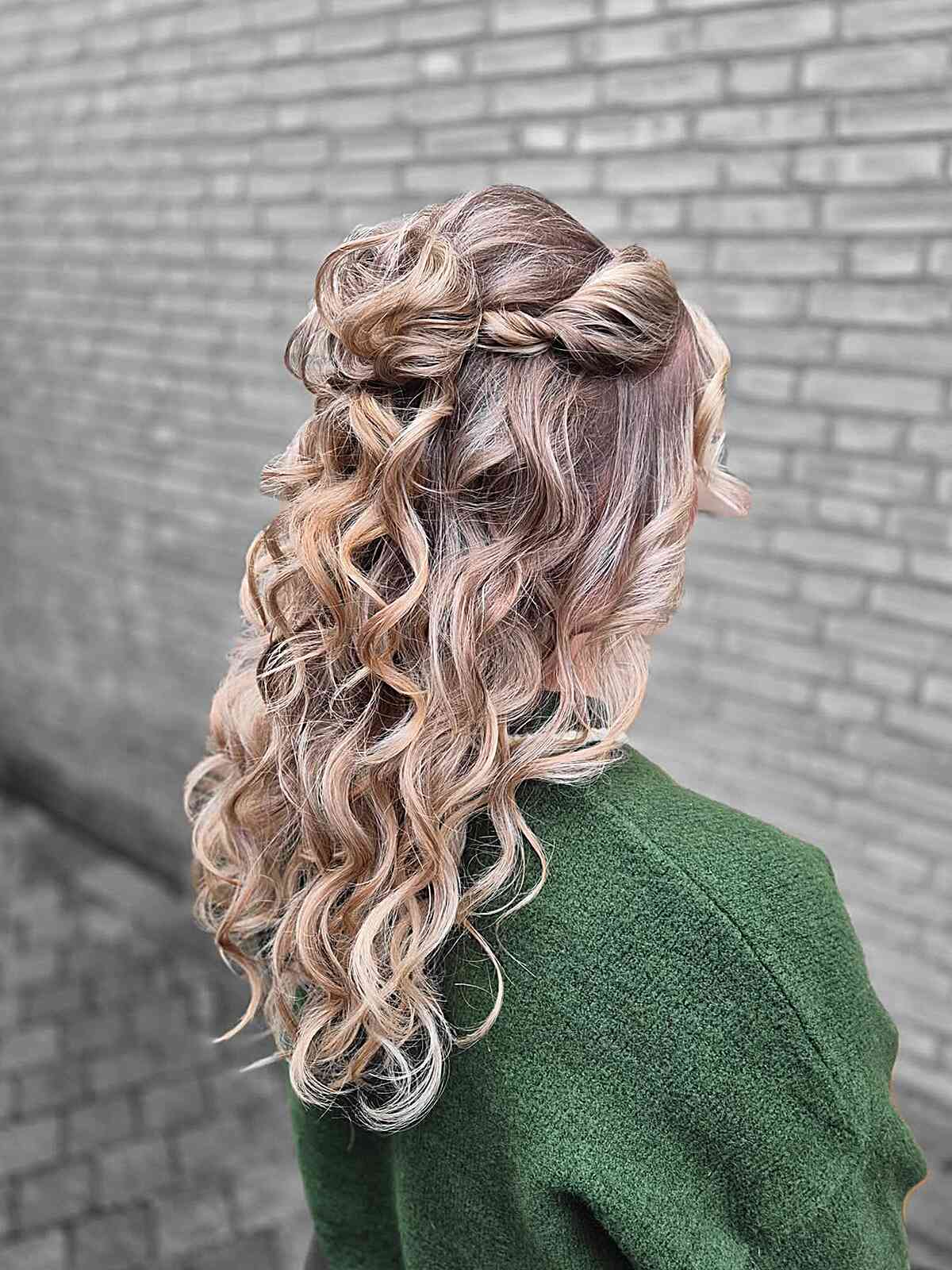 Twisted curls with rose gold highlights