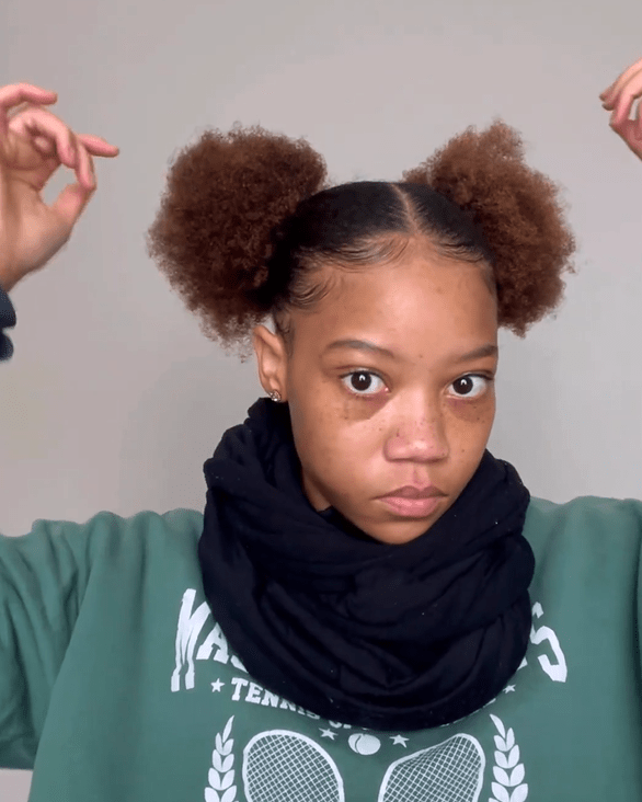 Fun double puffs hairstyle with natural texture