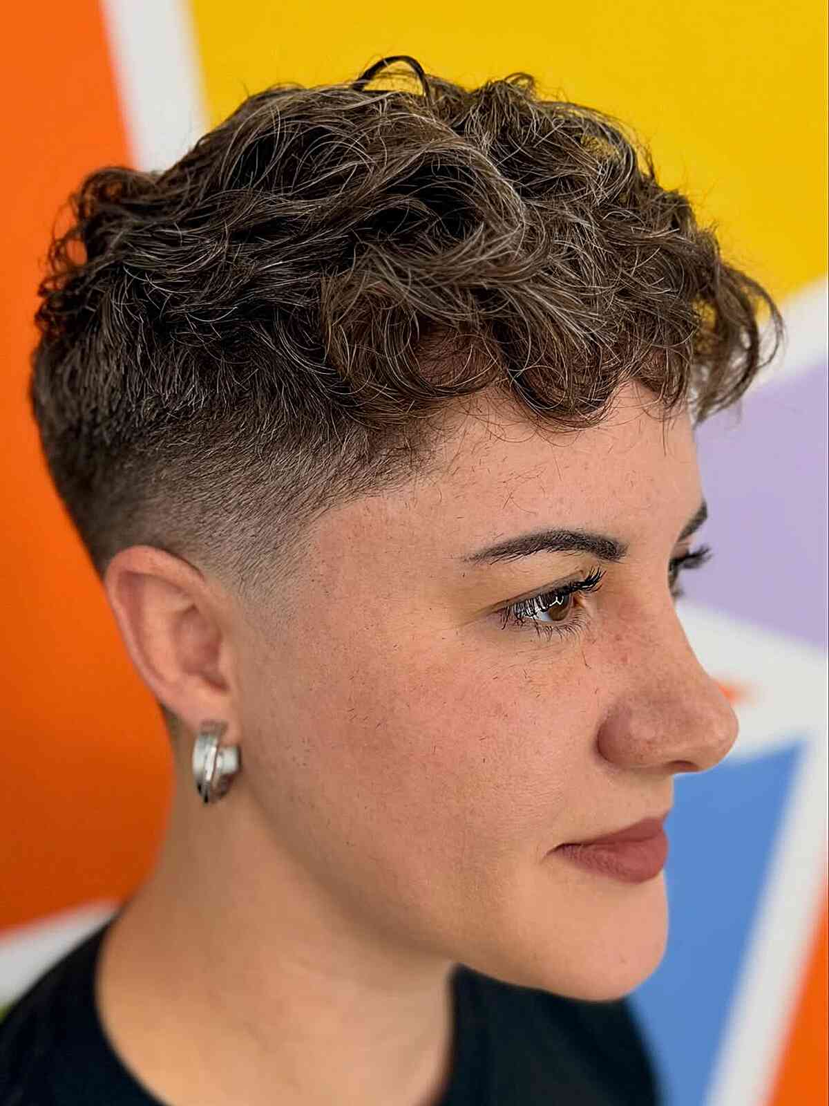 Edgy curly undercut for modern edge