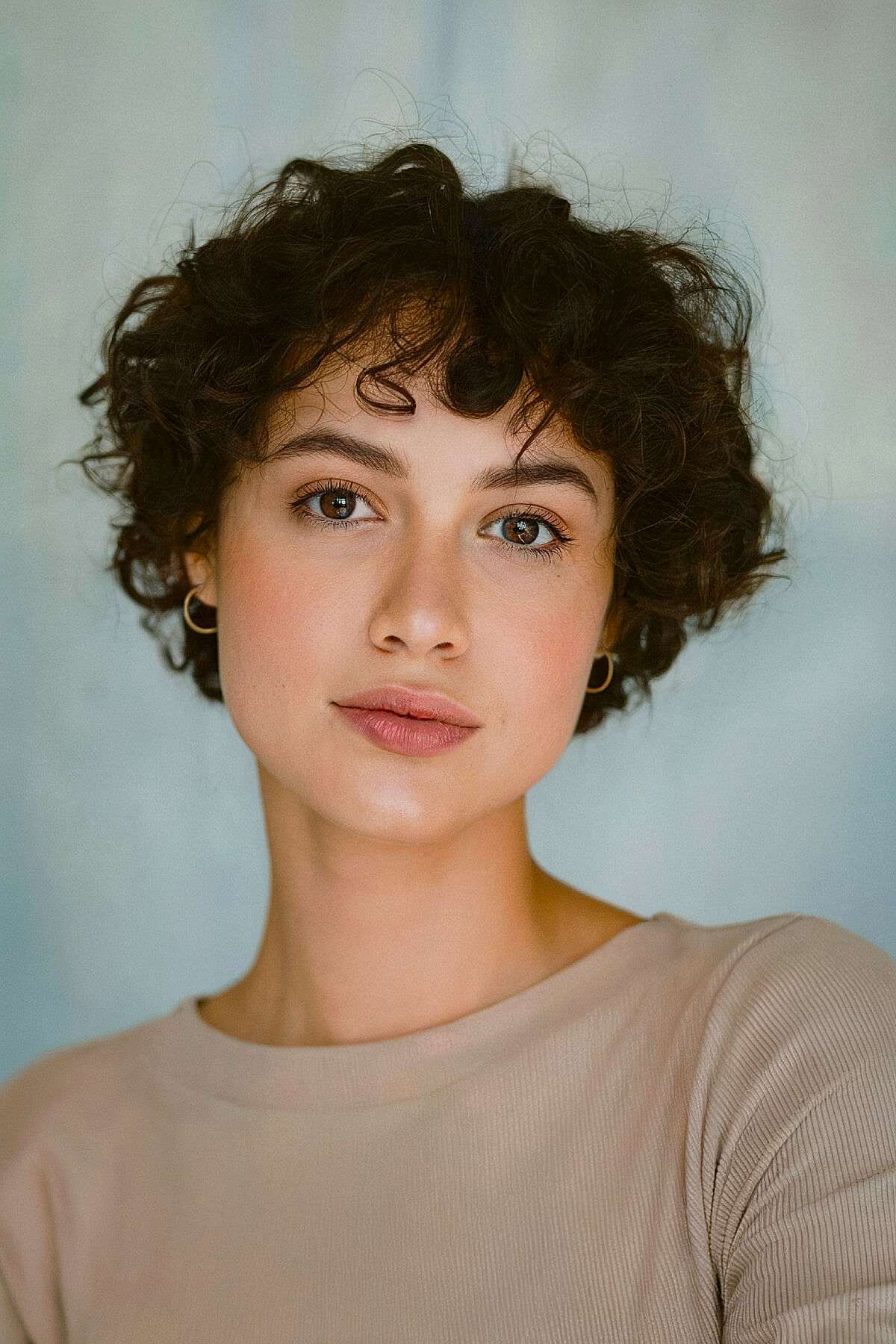 Soft curly pixie cut with gentle texture