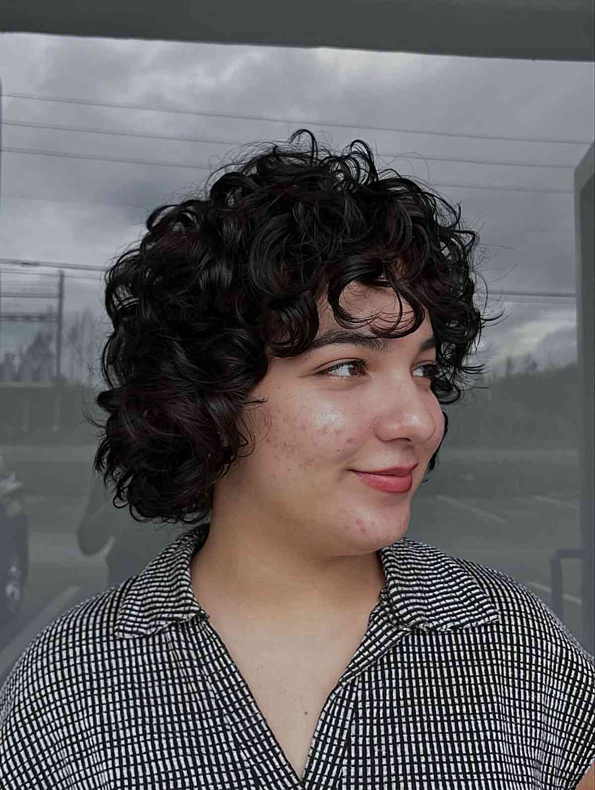 Classic curly bob with a stylish fringe