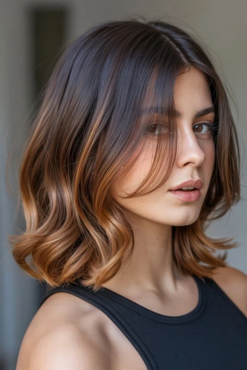 Wavy lob with subtle highlights