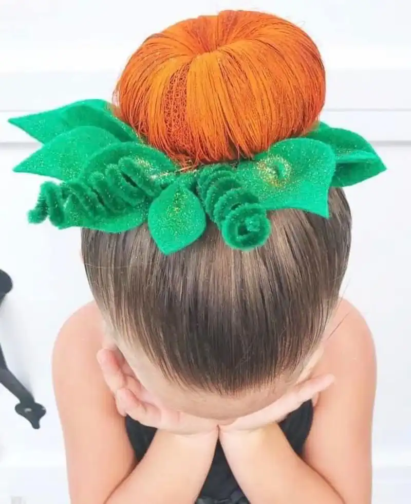 Pumpkin bun with green leaf accents for Halloween