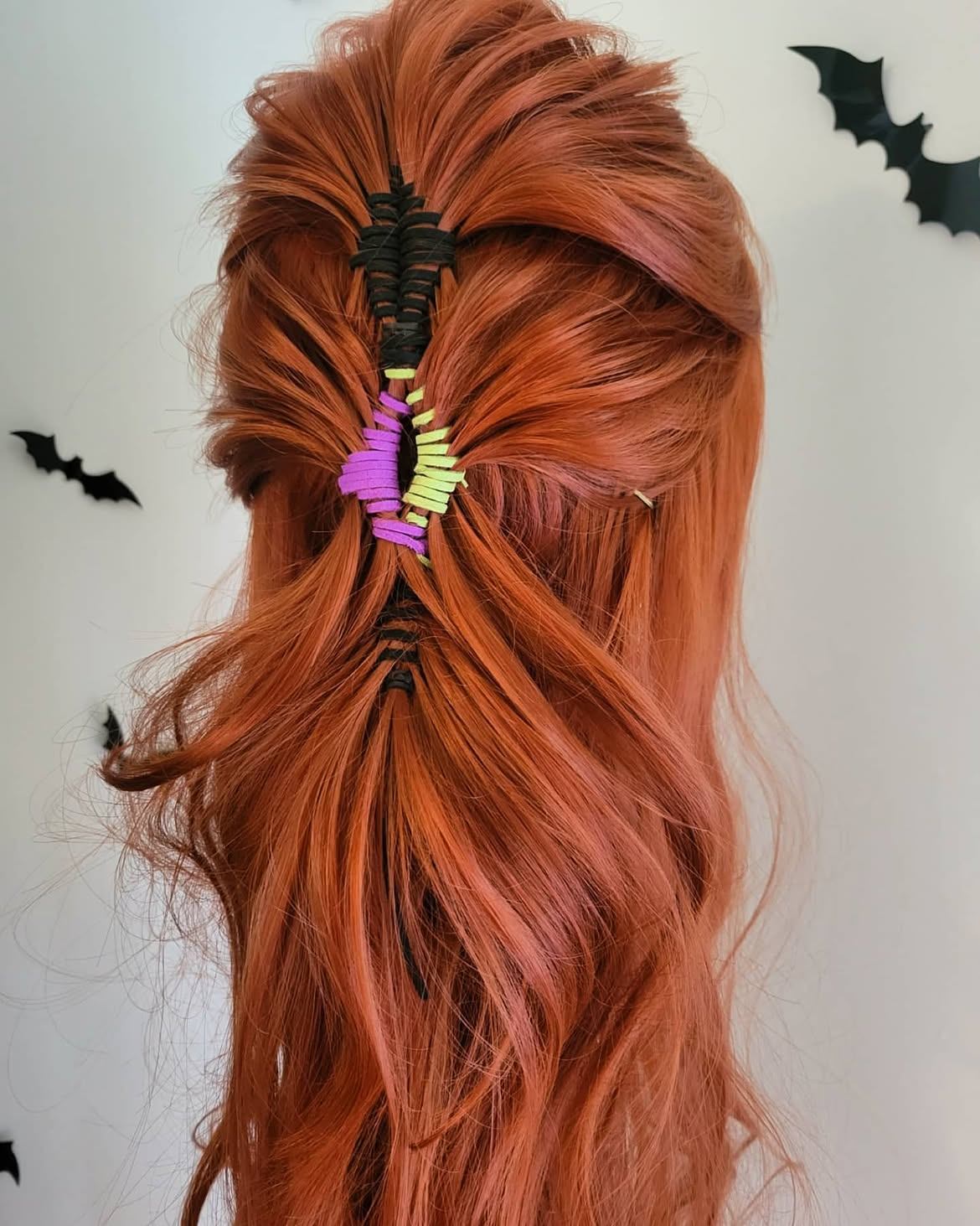 Halloween half-up hairstyle with colorful accents