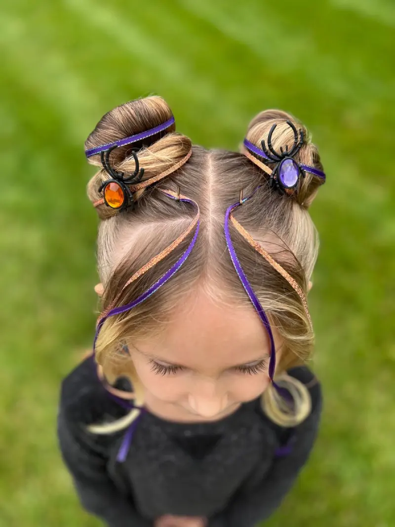 Spider-themed space buns with colorful accents
