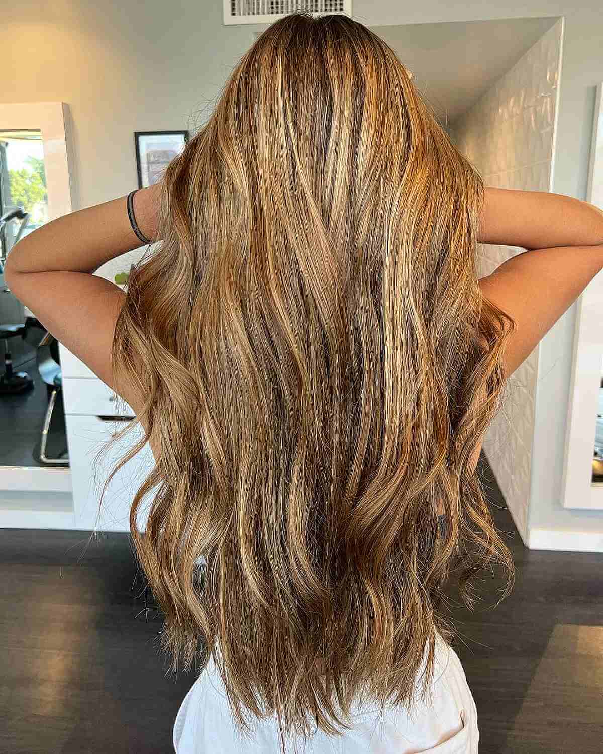 Long hair with sunlit honey blonde highlights