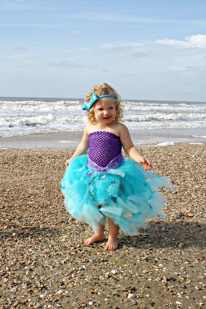 Mermaid costume, tulle and sequins by the sea