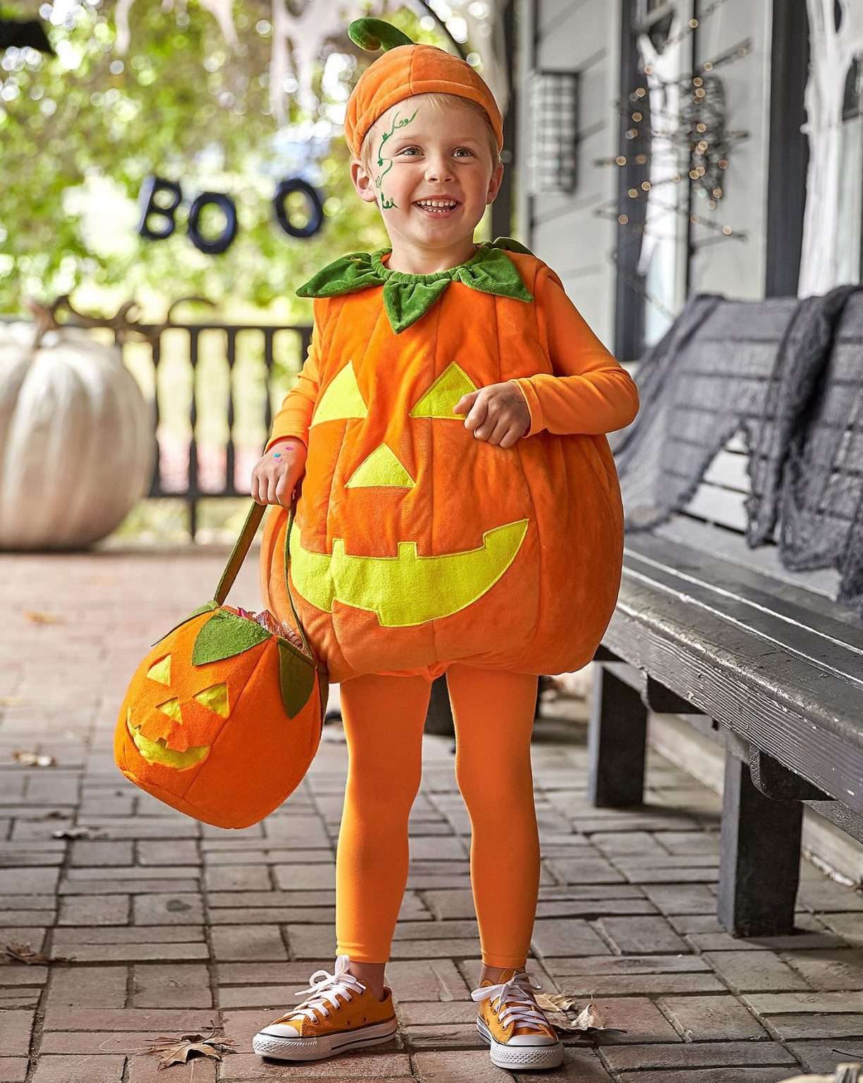 Pumpkin costume, orange and green hues