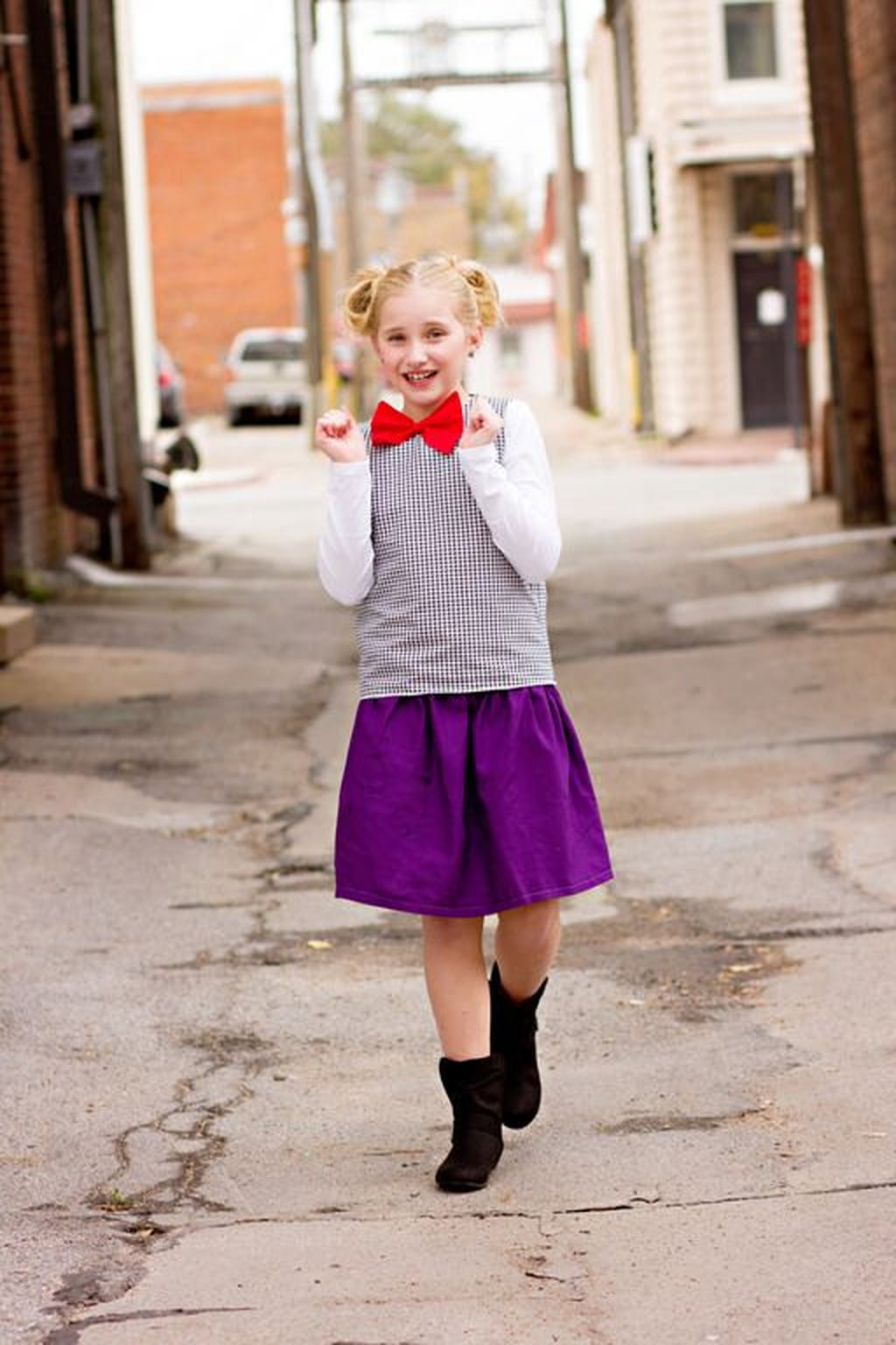 Schoolgirl costume, purple skirt and red bow