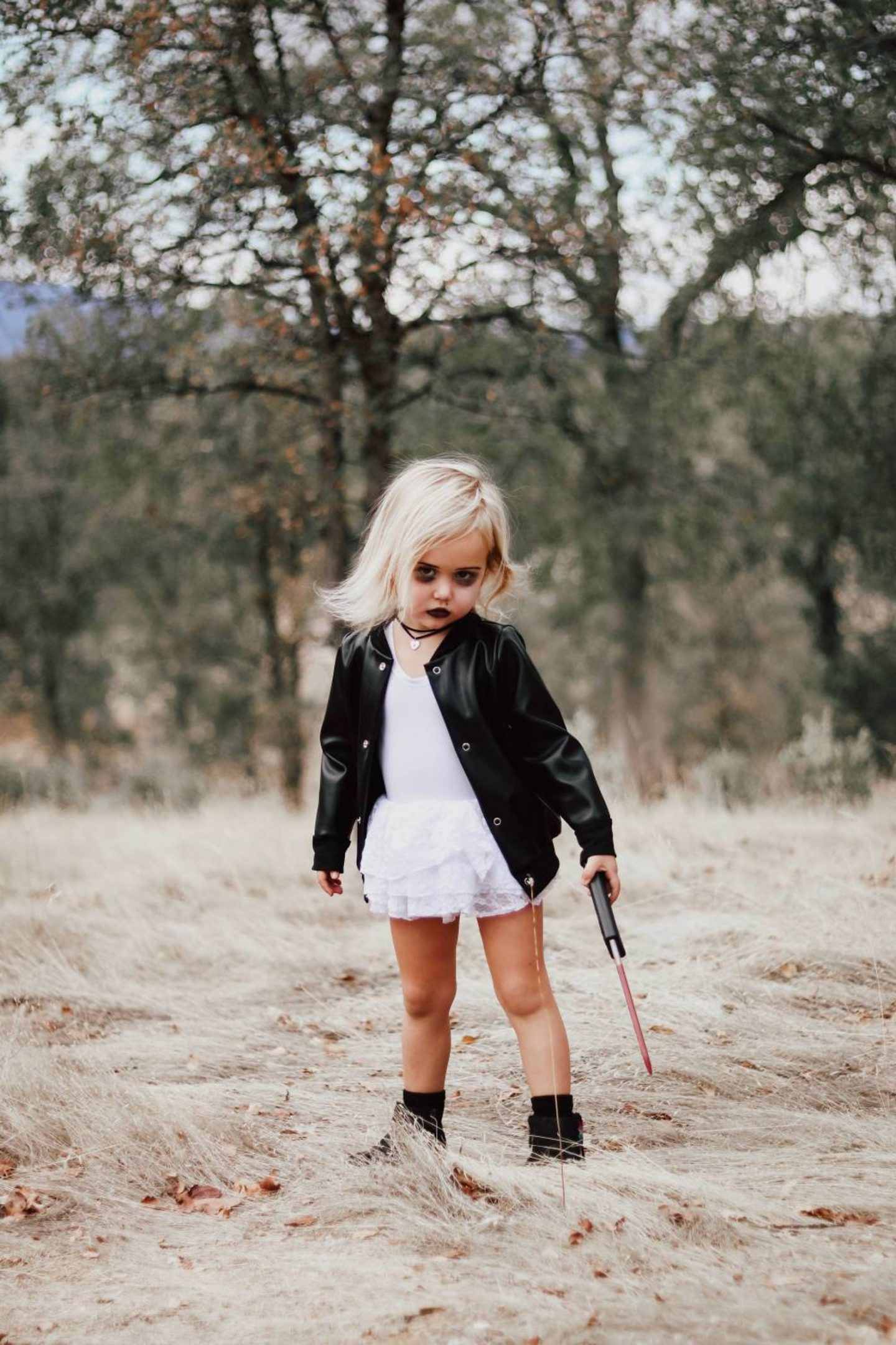 Rocker costume, leather jacket and white dress