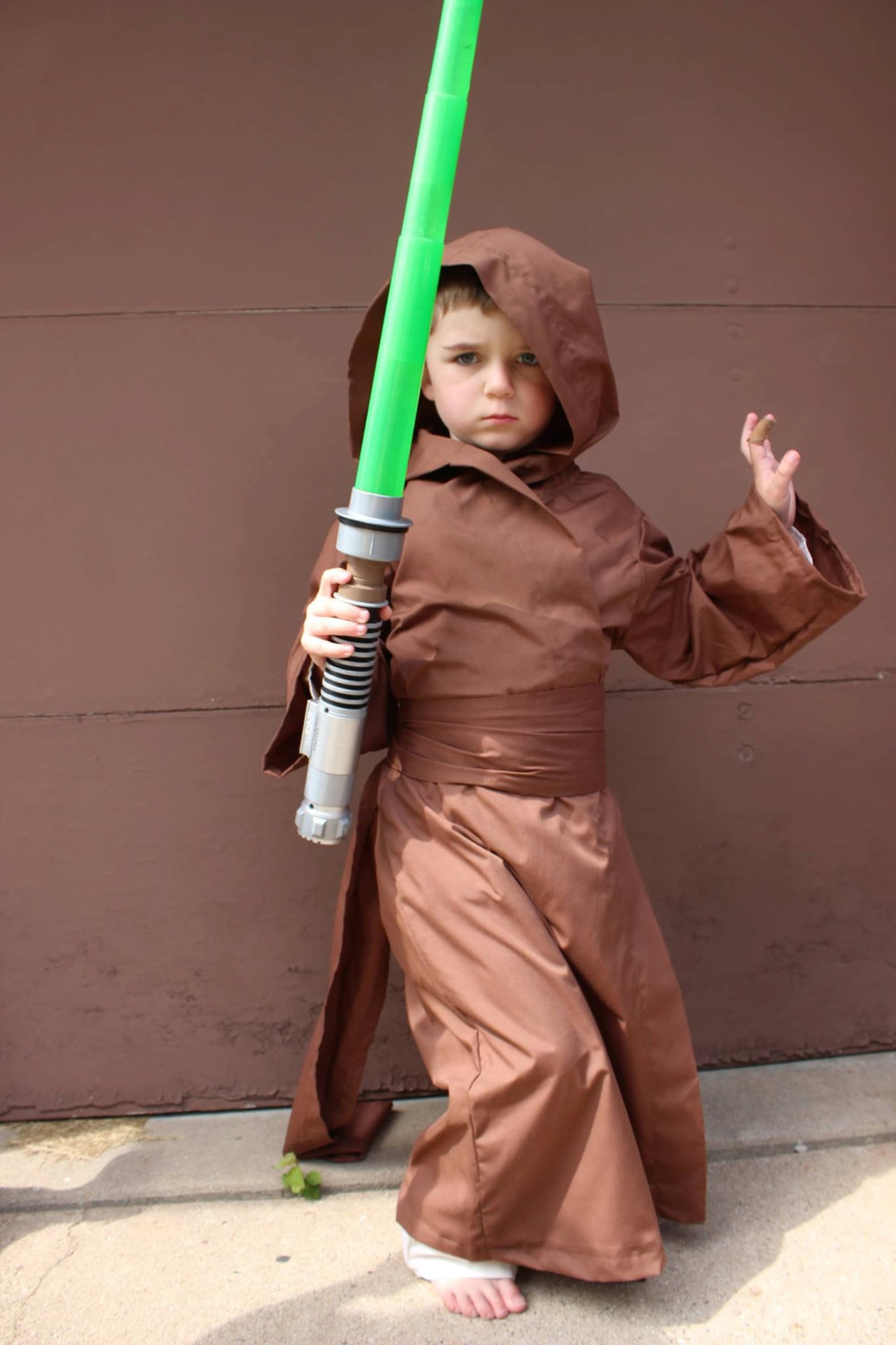 Jedi costume, brown robe and lightsaber