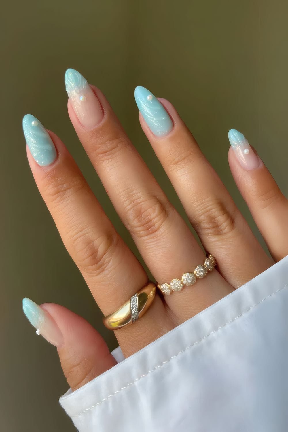 Pastel nails with pearlescent glow, ethereal beauty