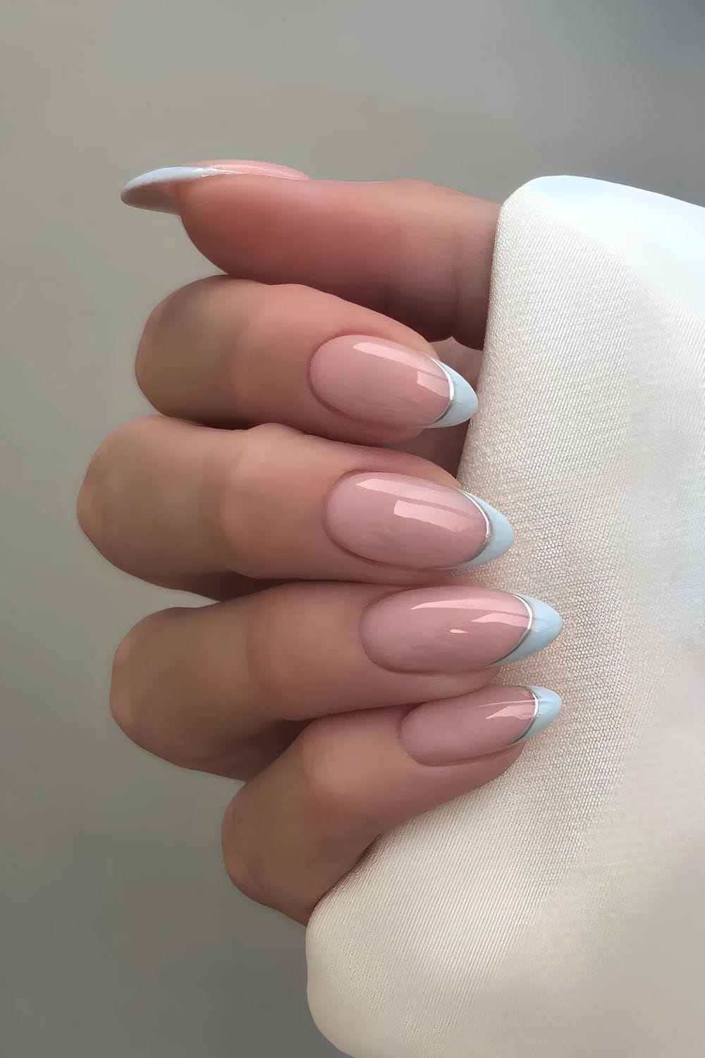 Classic French manicure with blue tips
