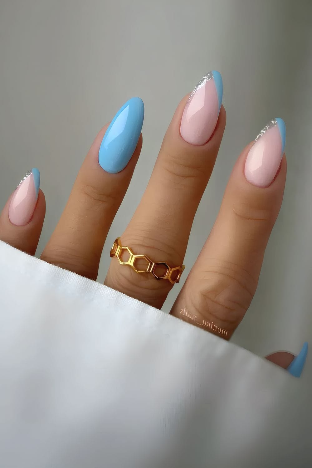 Two-tone blue and nude manicure