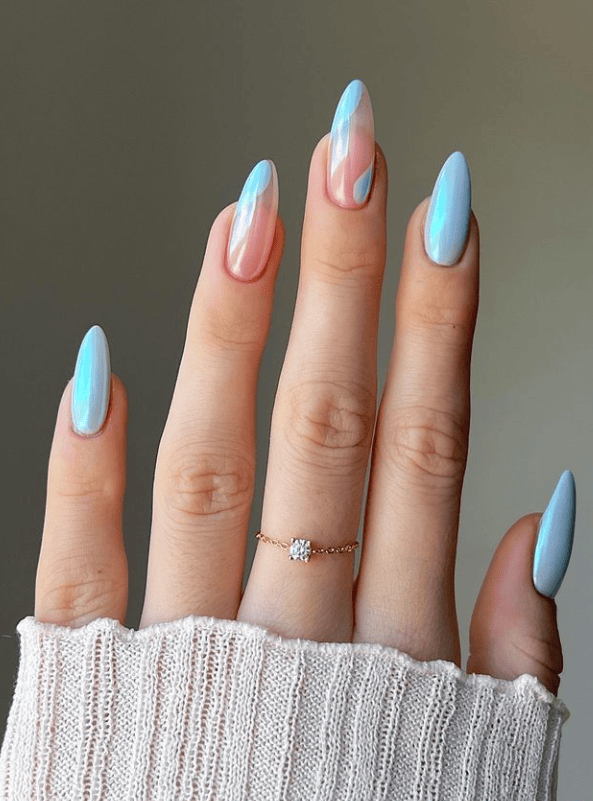 Iridescent light blue nails with almond shape
