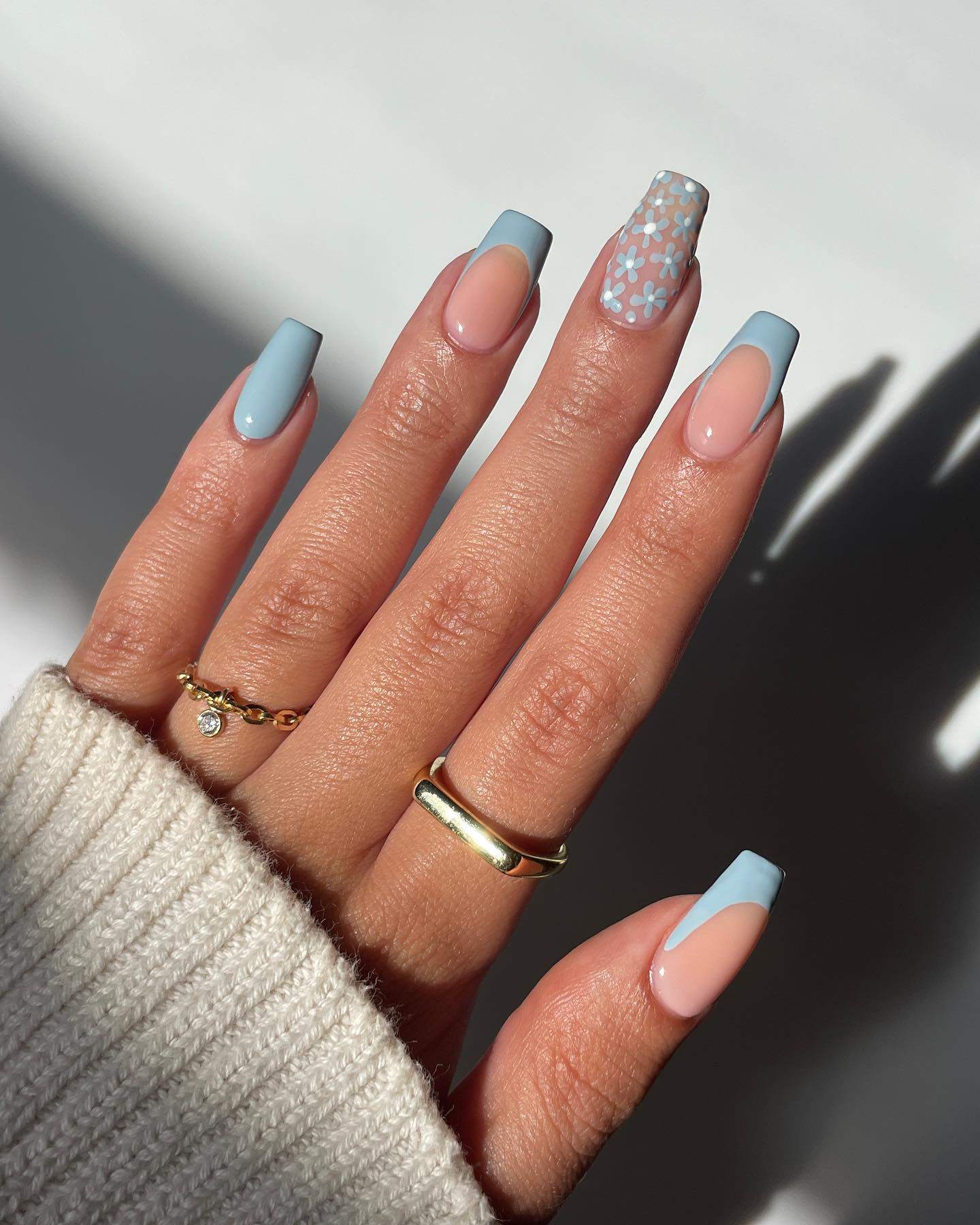 Floral French with blue tips and floral design