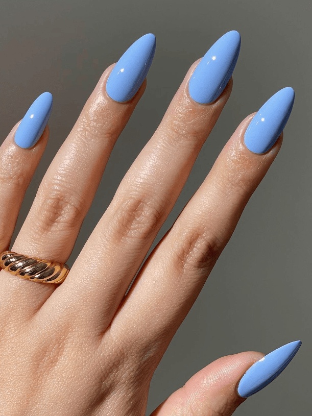 Solid sky blue on almond nails