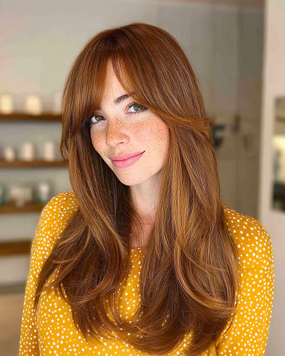 Long layered hair with golden highlights