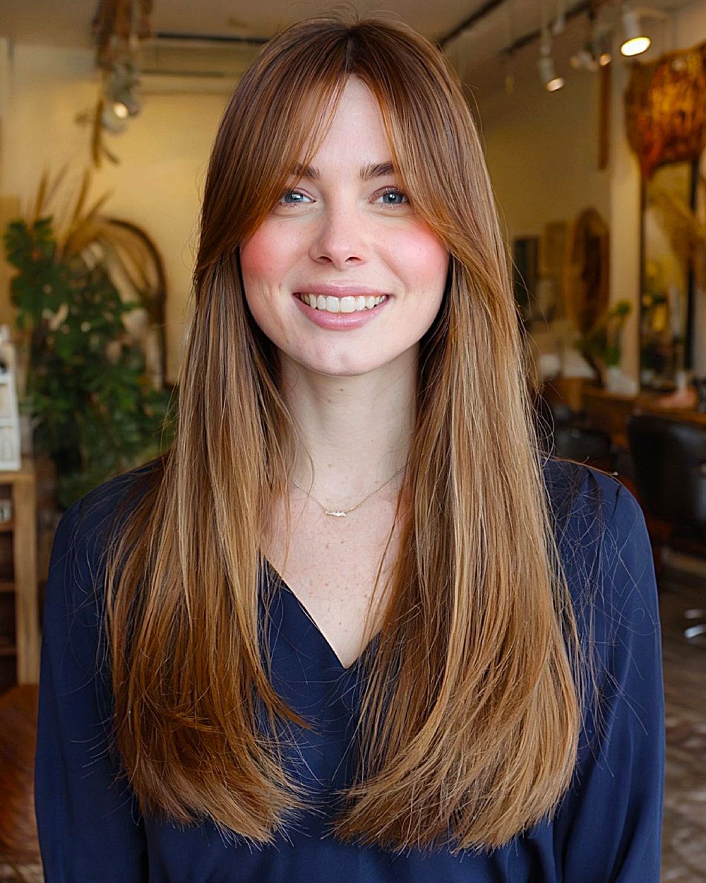 Long blonde hair with curtain bangs