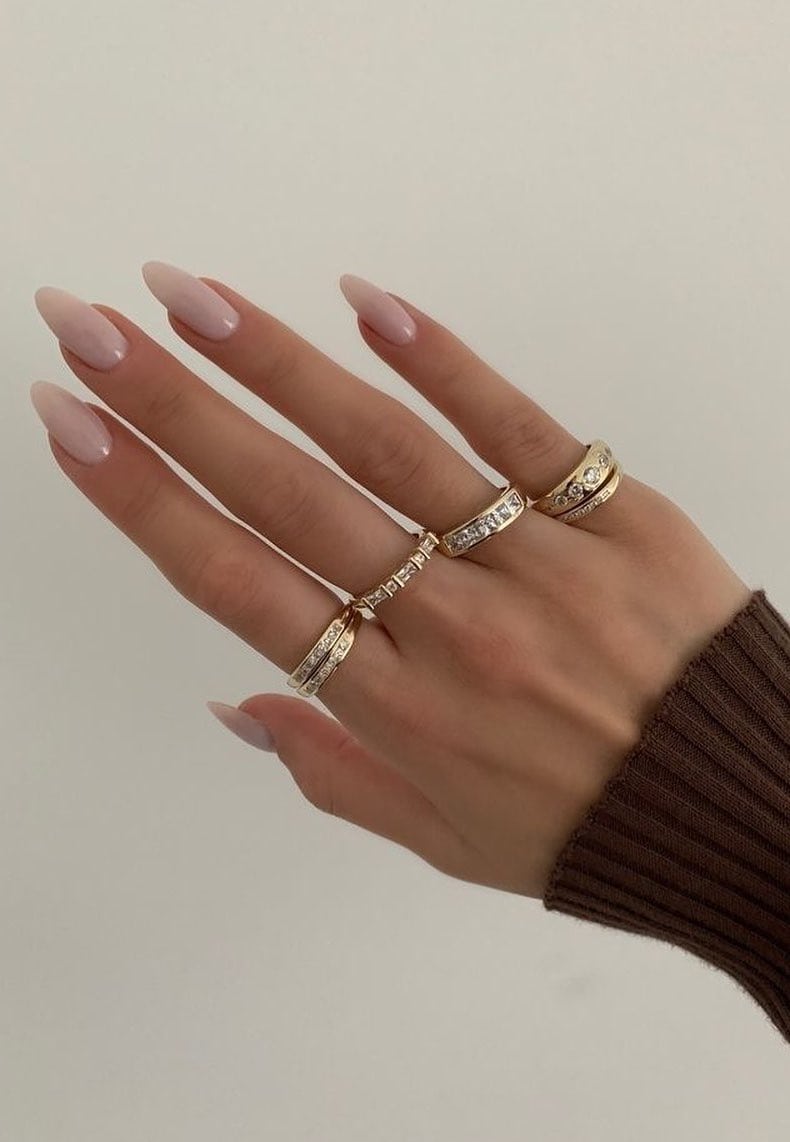 Soft nude almond nails with minimalist elegance, versatile wear