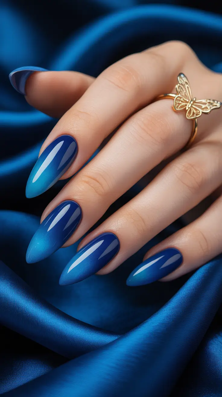 Blue ombre almond nails with gradient effect