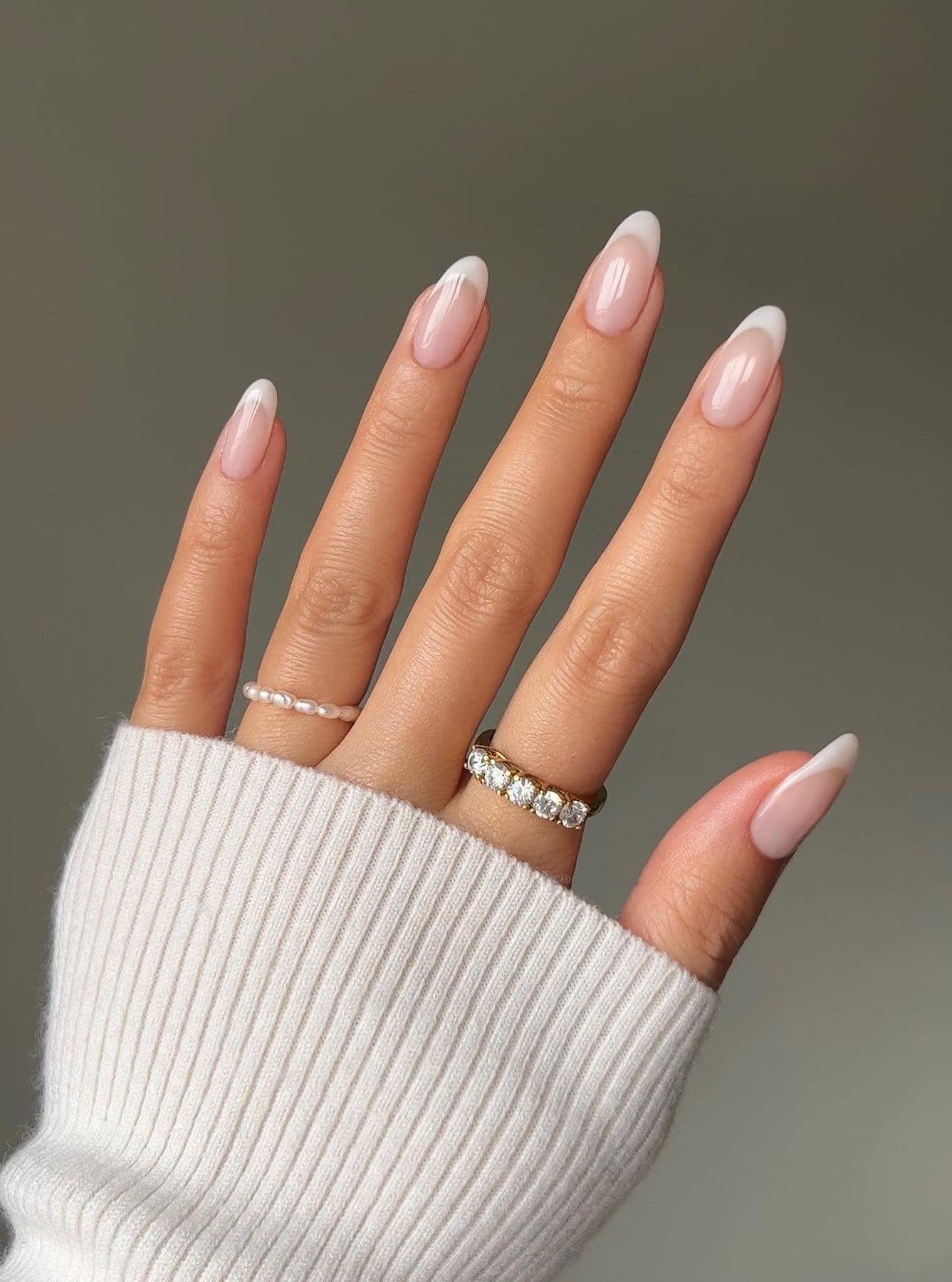 Subtle pink French almond nails, classic and modern