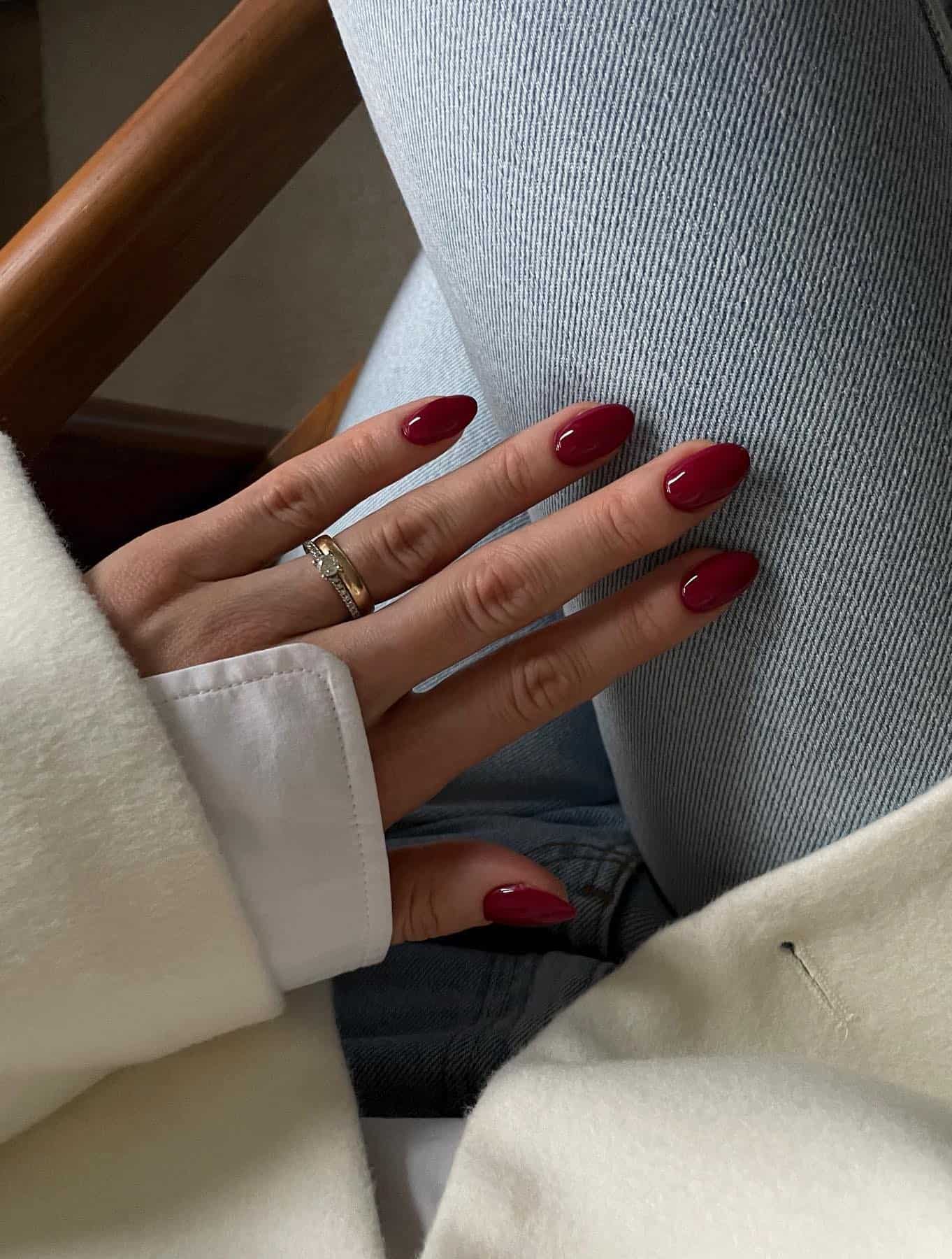 Deep burgundy oval nails, classic and versatile