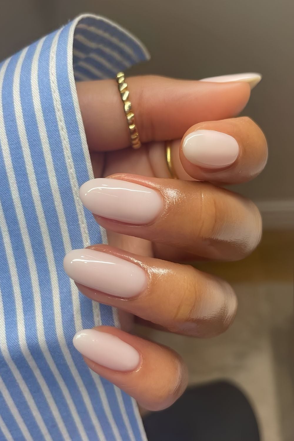 Milky oval nails, glossy finish, timeless elegance