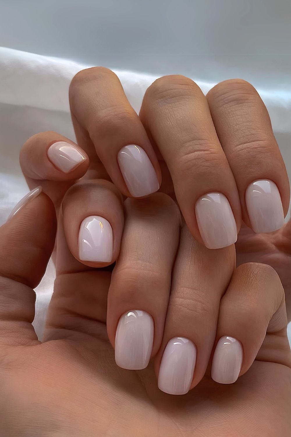 Glossy milky squoval nails, everyday elegance