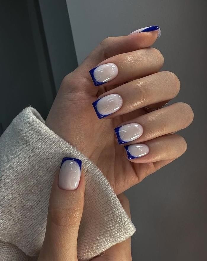 Square nails with blue tips, bold and modern