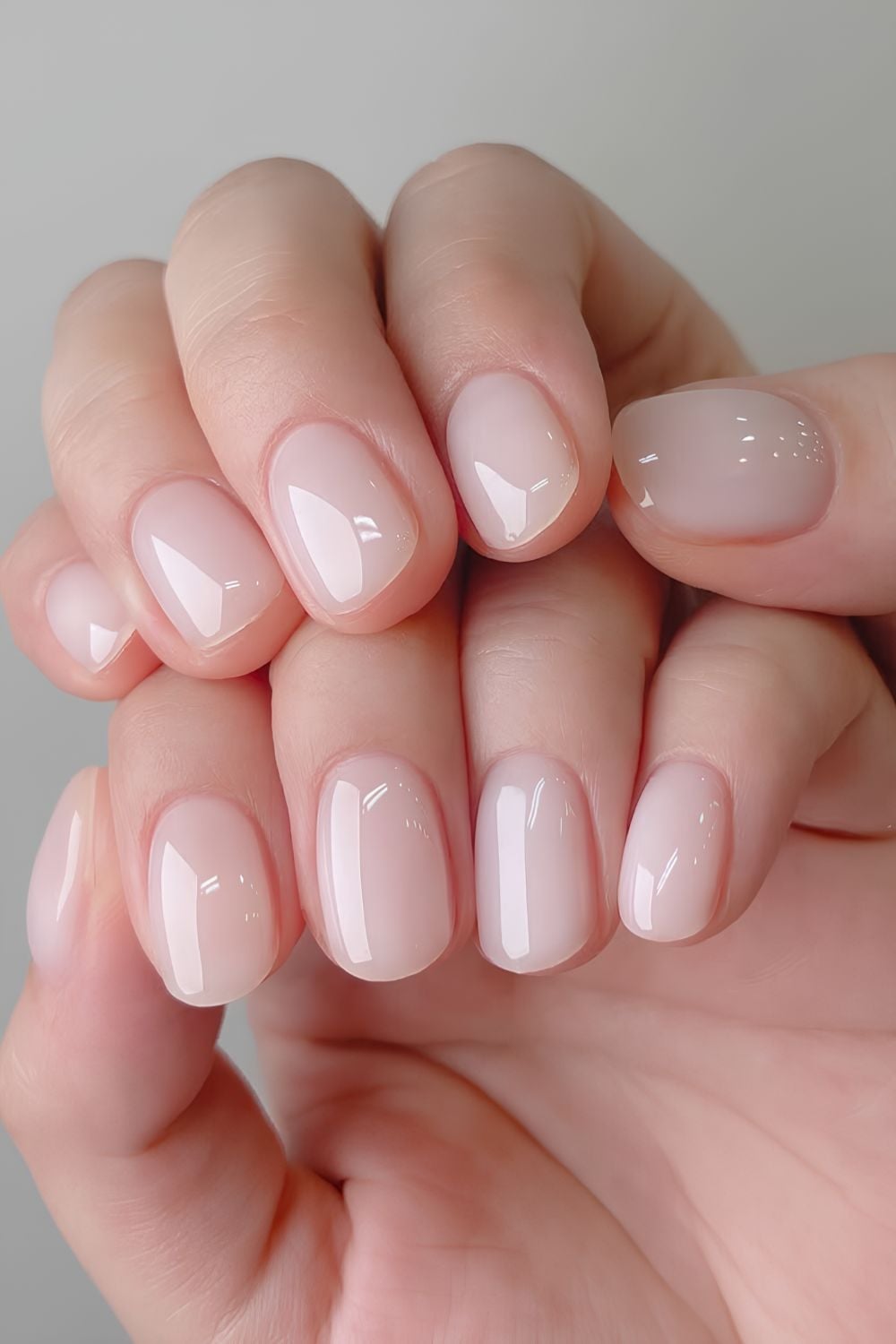 Glossy milky squoval nails, elegant and versatile