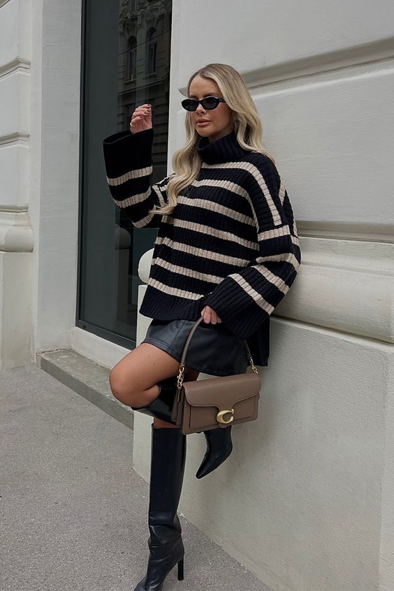 Striped sweater and black mini skirt with boots