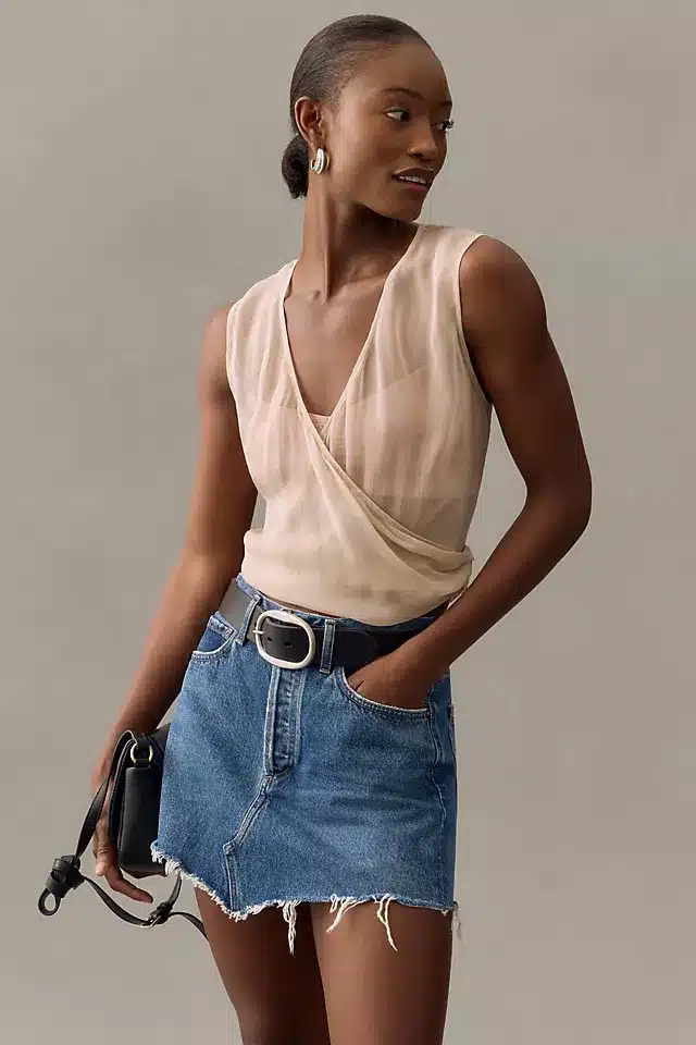 Beige top with denim mini skirt