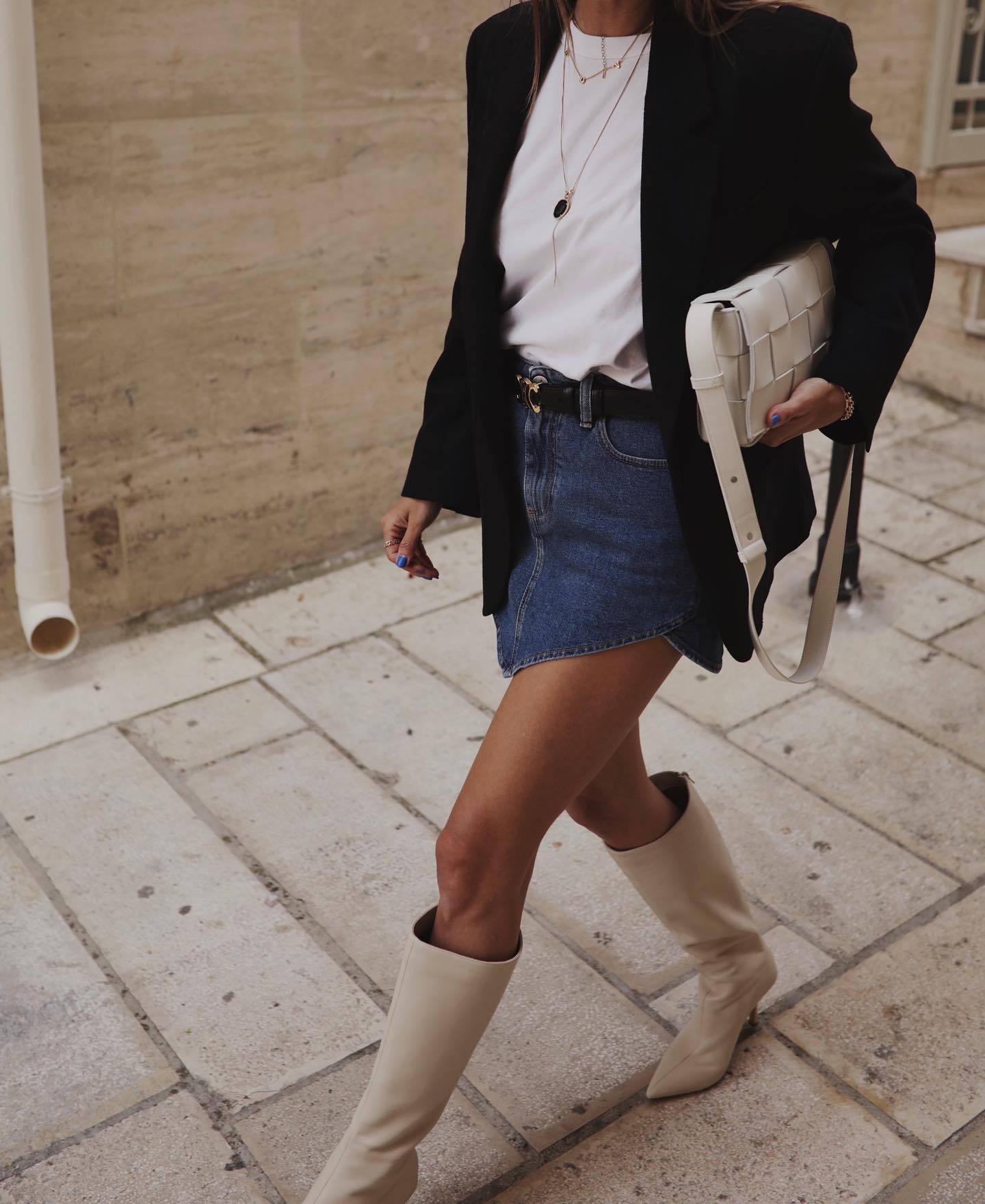 Blazer and denim mini skirt with boots