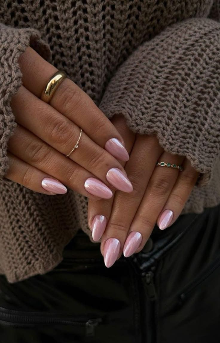 Almond nails with pink pearl sheen.