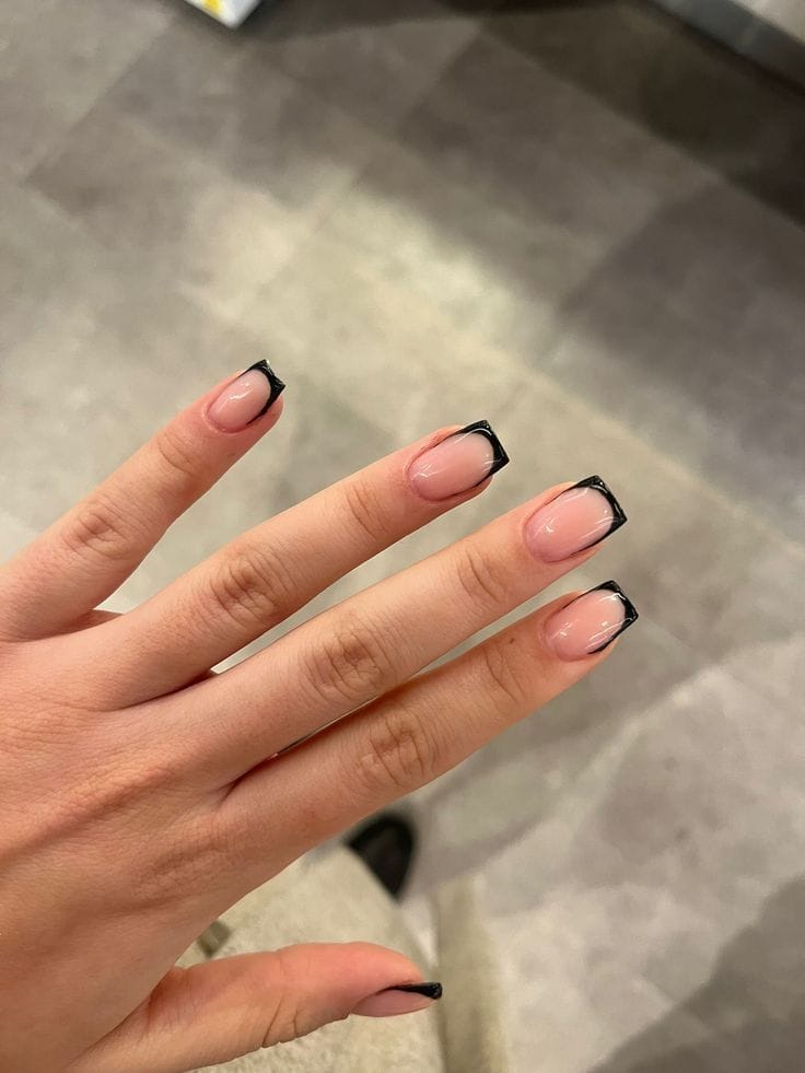 Square nails with black edge French tips.