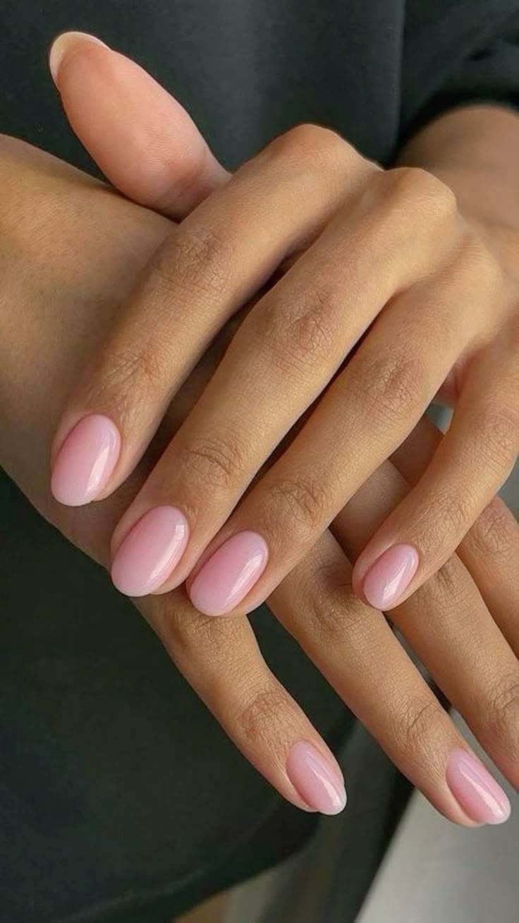 Oval nails with classic pink gloss.