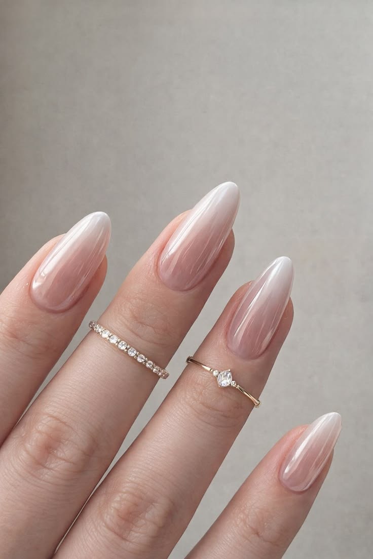 Almond nails with ombre nude effect.